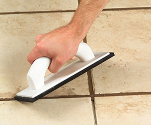 applying grout